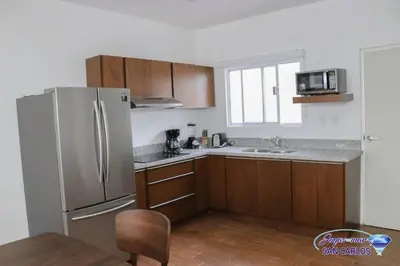 Una cocina o zona de cocina en Departamento Turquesa 4 Joyas de San Carlos