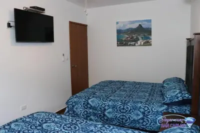 Cama o camas de una habitación en Departamento Turquesa 4 Joyas de San Carlos