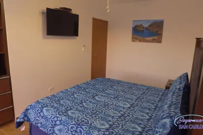 Cama o camas de una habitación en Departamento Topacio 1 Joyas del Mar