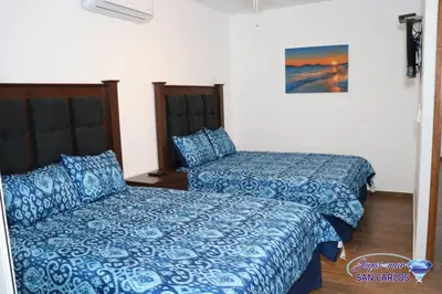 Cama o camas de una habitación en Departamento Topacio 2 Joyas del mar San Carlos