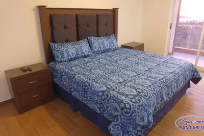 Cama o camas de una habitación en Departamento Topacio 2 Joyas del mar San Carlos