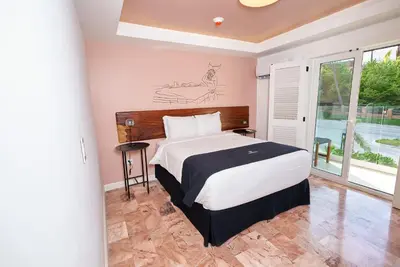 Cama o camas de una habitación en The Xperience by g