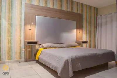 Cama o camas de una habitación en Tu Refugio Ideal ubicado en Marina Mazatlán by G P S rentas