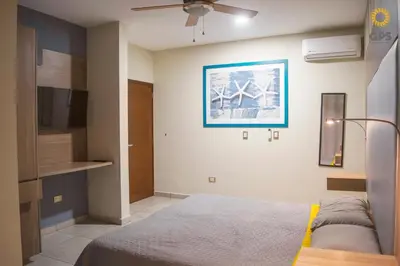 Cama o camas de una habitación en Tu Refugio Ideal ubicado en Marina Mazatlán by G P S rentas