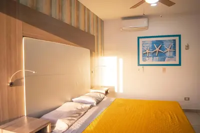 Cama o camas de una habitación en bonita habitación hotelera con balcón by G P S rentas