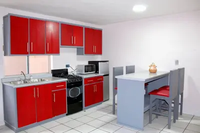Una cocina o zona de cocina en Departamentos Cumbres de Creel