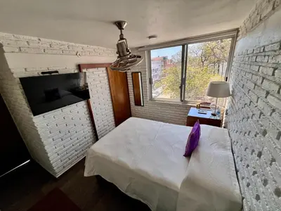 Cama o camas de una habitación en Hosteleria Casa Margarita