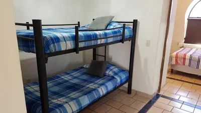 Cama o camas de una habitación en Departamento Zona Dorada Mazatlán 6
