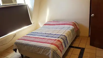 Cama o camas de una habitación en Departamento Zona Dorada Mazatlán 6