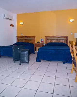 Cama o camas de una habitación en Hotel Las Fuentes