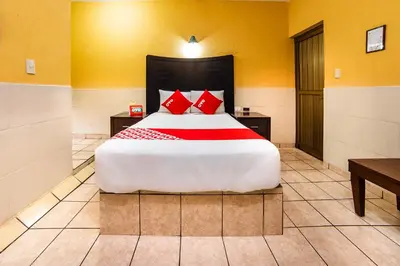 Cama o camas de una habitación en Hotel San Marcos