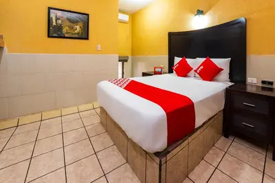 Cama o camas de una habitación en Hotel San Marcos
