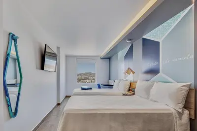 Cama o camas de una habitación en One Chihuahua Norte