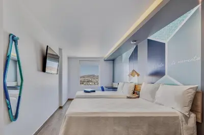 Cama o camas de una habitación en One Chihuahua Norte