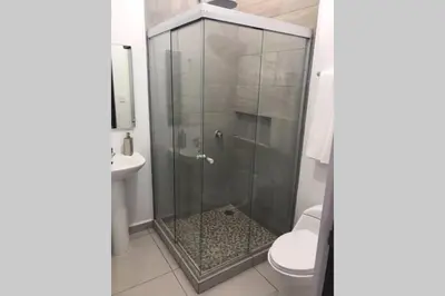 Un baño de Palmilla residencial departamento en zona privada
