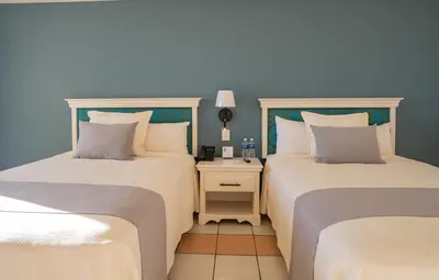Cama o camas de una habitación en Sunset Palace Beach Hotel - All Inclusive