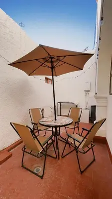 Un patio o zona al aire libre en Hostal La española Parras