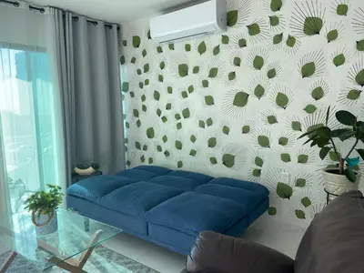 Zona de estar de Departamento con vista al mar