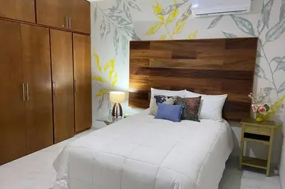Cama o camas de una habitación en Departamento con vista al mar