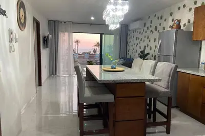 Zona de estar de Departamento con vista al mar