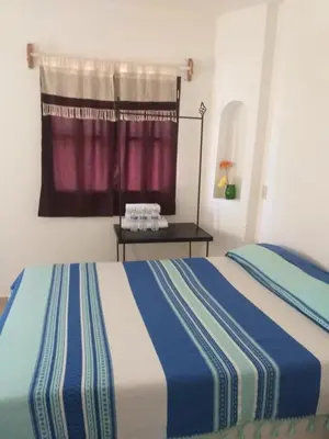 Cama o camas de una habitación en Loreto La Regional