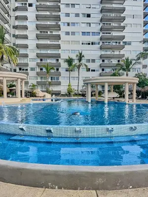 Piscina en o cerca de FRENTE AL MAR A PIE DE PLAYA CON ALBERCA yJACUZZY
