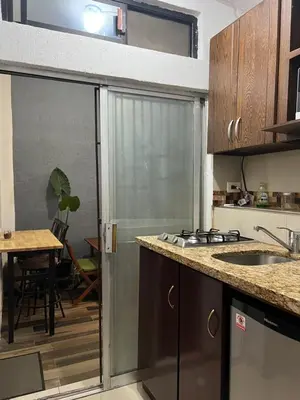 Una cocina o zona de cocina en DEPARTAMENTO RES CAMPESTRE DE 3 HABITACIONES Y 4 CAMAS