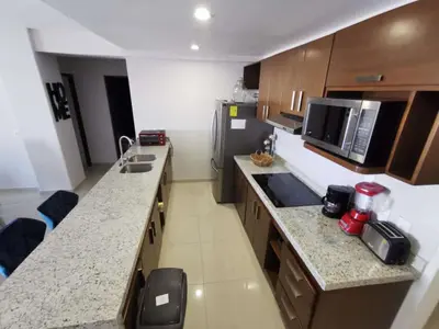 Una cocina o zona de cocina en APARTAMENTO CON ALBERCA en Mazatlán