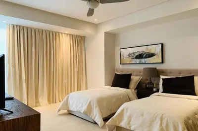 Cama o camas de una habitación en Peninsula Mzt Renta Departamentos Vacacionales p4