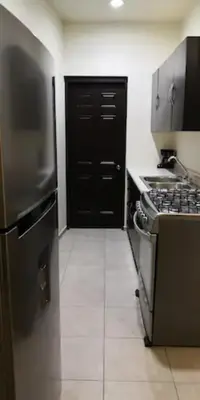 Una cocina o zona de cocina en Departamento Y