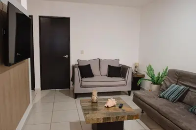 Zona de estar de Amplio, hermoso, cómodo depa en Mazatlán