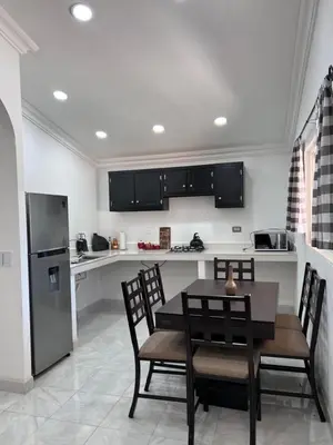 Una cocina o zona de cocina en Cabañas el Pino 2