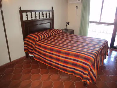 Cama o camas de una habitación en La Casa Contenta