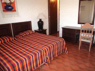 Cama o camas de una habitación en La Casa Contenta