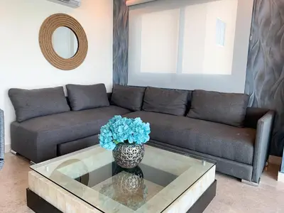 Zona de estar de Departamento en el malecón, Torre Central 102