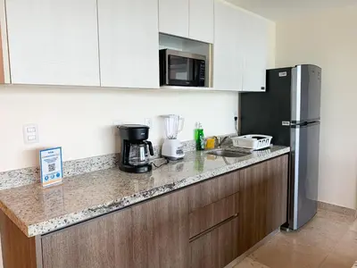 Una cocina o zona de cocina en Departamento en el malecón, Torre Central 102