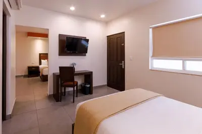 Cama o camas de una habitación en Hotel Buen Valle