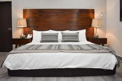 Cama o camas de una habitación en Hotel Plaza Cuatro Ciénegas