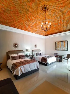 Cama o camas de una habitación en Hotel Plaza Cuatro Ciénegas