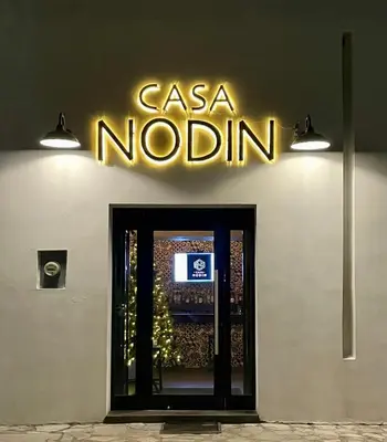 Certificado, premio, señal o documento que está expuesto en Hotel Casa Nodin