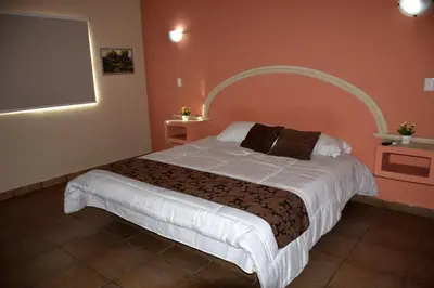 Cama o camas de una habitación en Hotel Parque Inn