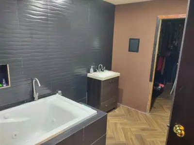 Un baño de Jardines Casa