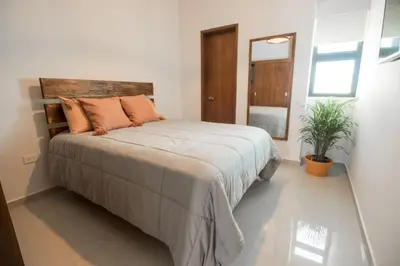 Cama o camas de una habitación en Acogedor departamento Boho cerca de la playa