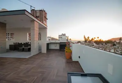 Un balcón o terraza de Acogedor departamento Boho cerca de la playa