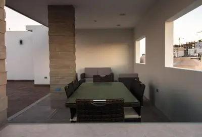 Zona de estar de Acogedor departamento Boho cerca de la playa