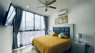 Cama o camas de una habitación en Depa lujoso cerca del malecón by G P S rentas