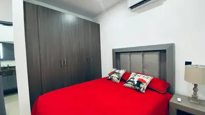 Cama o camas de una habitación en Depa lujoso cerca del malecón by G P S rentas