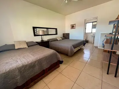 Cama o camas de una habitación en Casa Llena de Vida LB8 Alberca privada VISTA A LA BAHIA