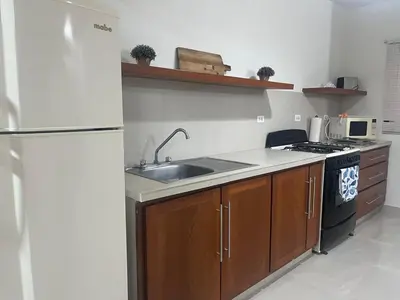 Una cocina o zona de cocina en Casa Llena de Vida LB8 Alberca privada VISTA A LA BAHIA
