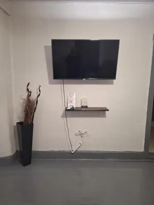 Una televisión o centro de entretenimiento en Casa en La zona Centro de la Ciudad